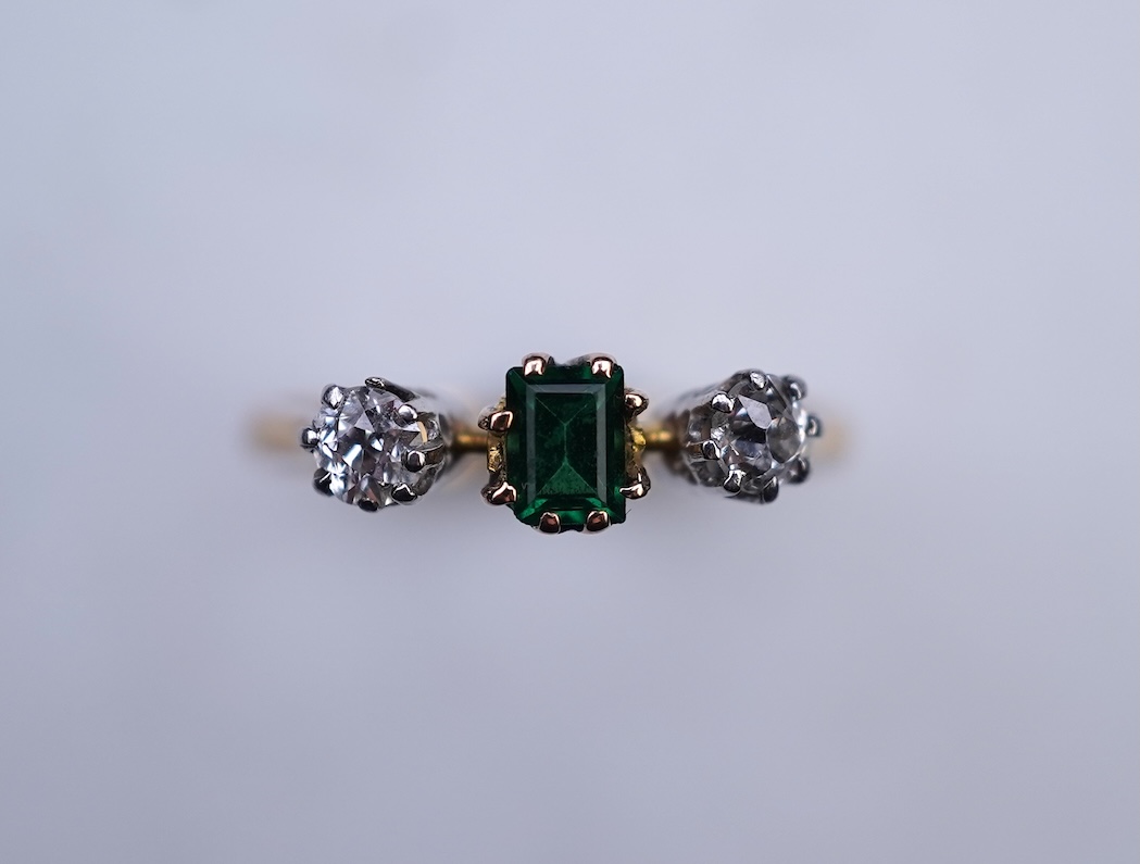 A tsavorite and diamond ring